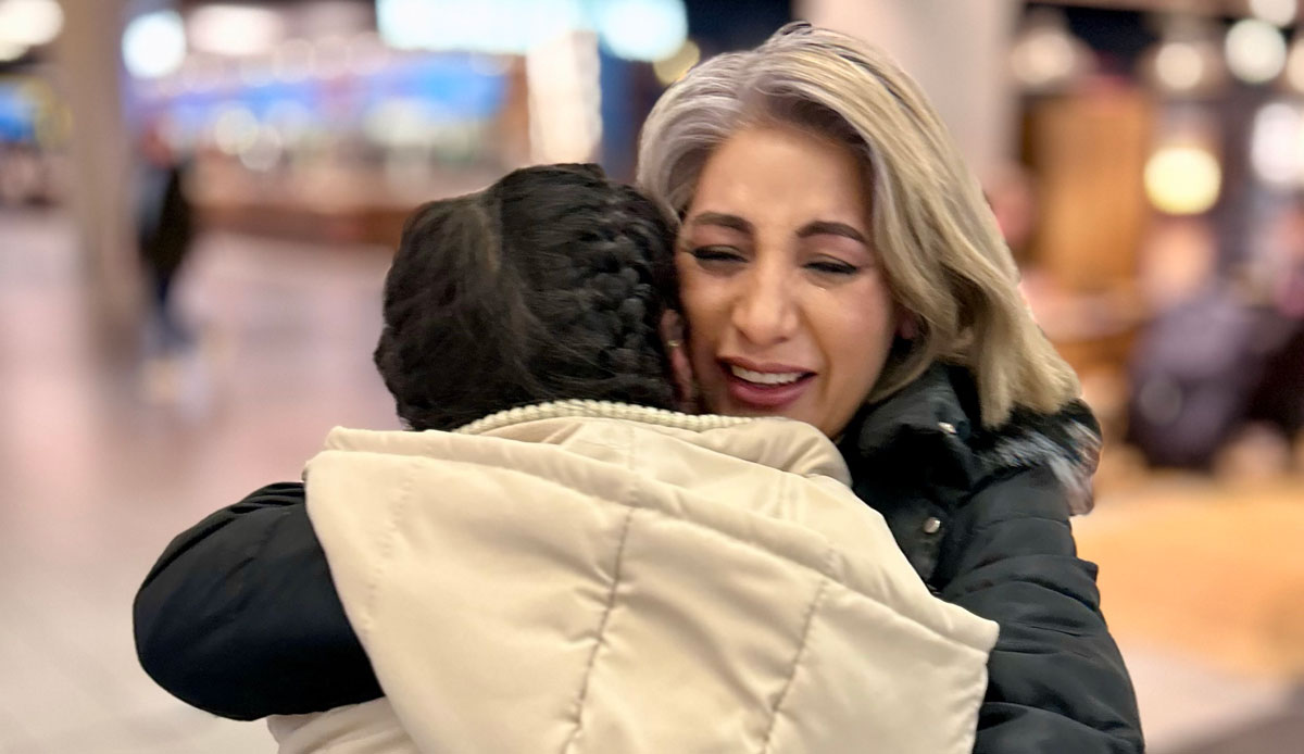 mother reunited with daughter - Helping Families Reunite: IOM’s Mileage Fund Brings Loved Ones Together